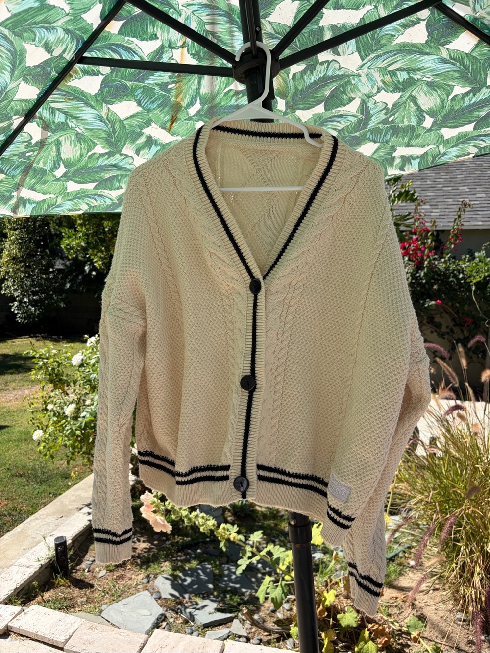 Taylor Swift Cream Cable-Knit Cardigan with Black Trim